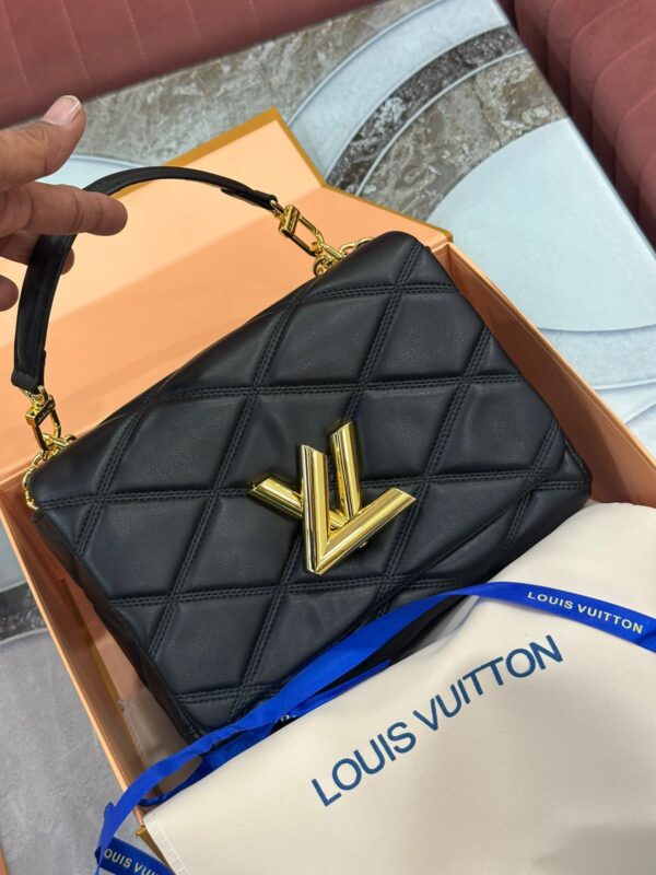 LOUISS VUITTONN GRAND TWISTER HANDBAG CUM SLING - Image 2