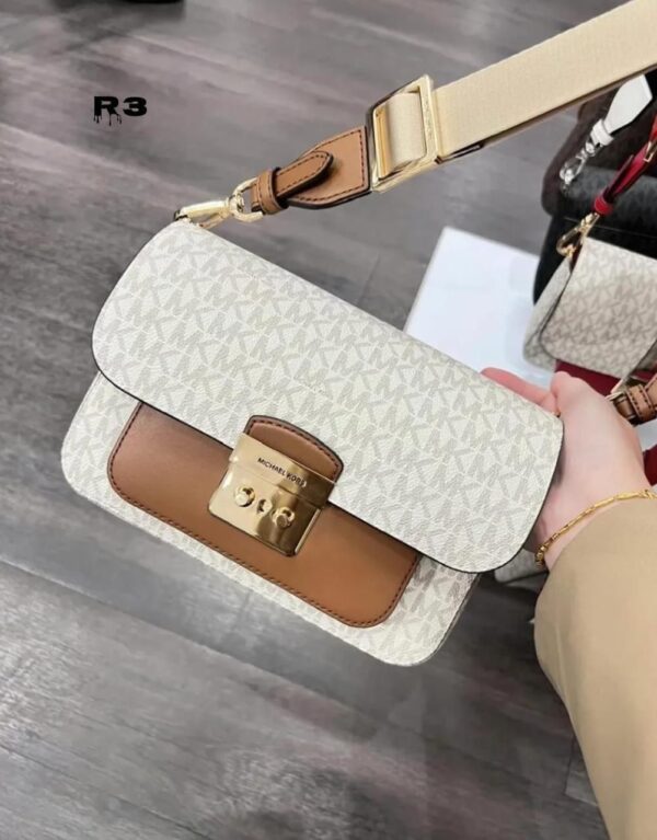 MICHAELL KORSS SOLAN EDITOR SLING BAGS