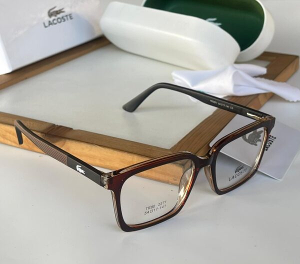 LACOSTEE TRANSPARENT LENS
