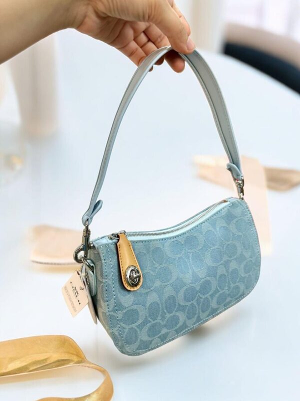 COACHH SWINGER BAG IN DENIM