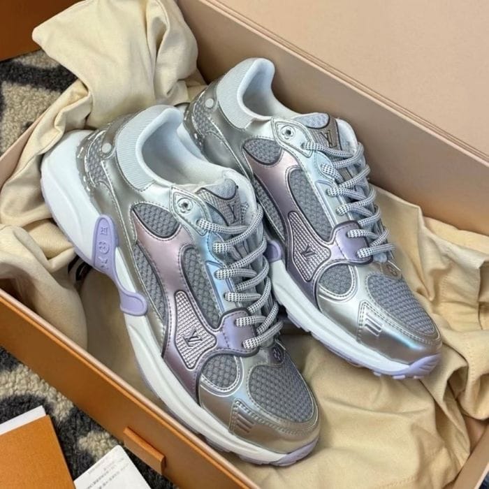 LOUISE VUITTONS OLYMPIA