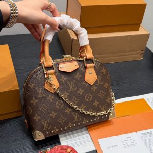 LOUISE VUITTONE ALMA TRUNK