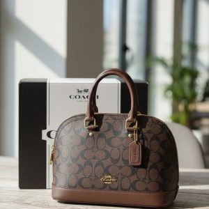 LATEST COACHE ALMA BAG