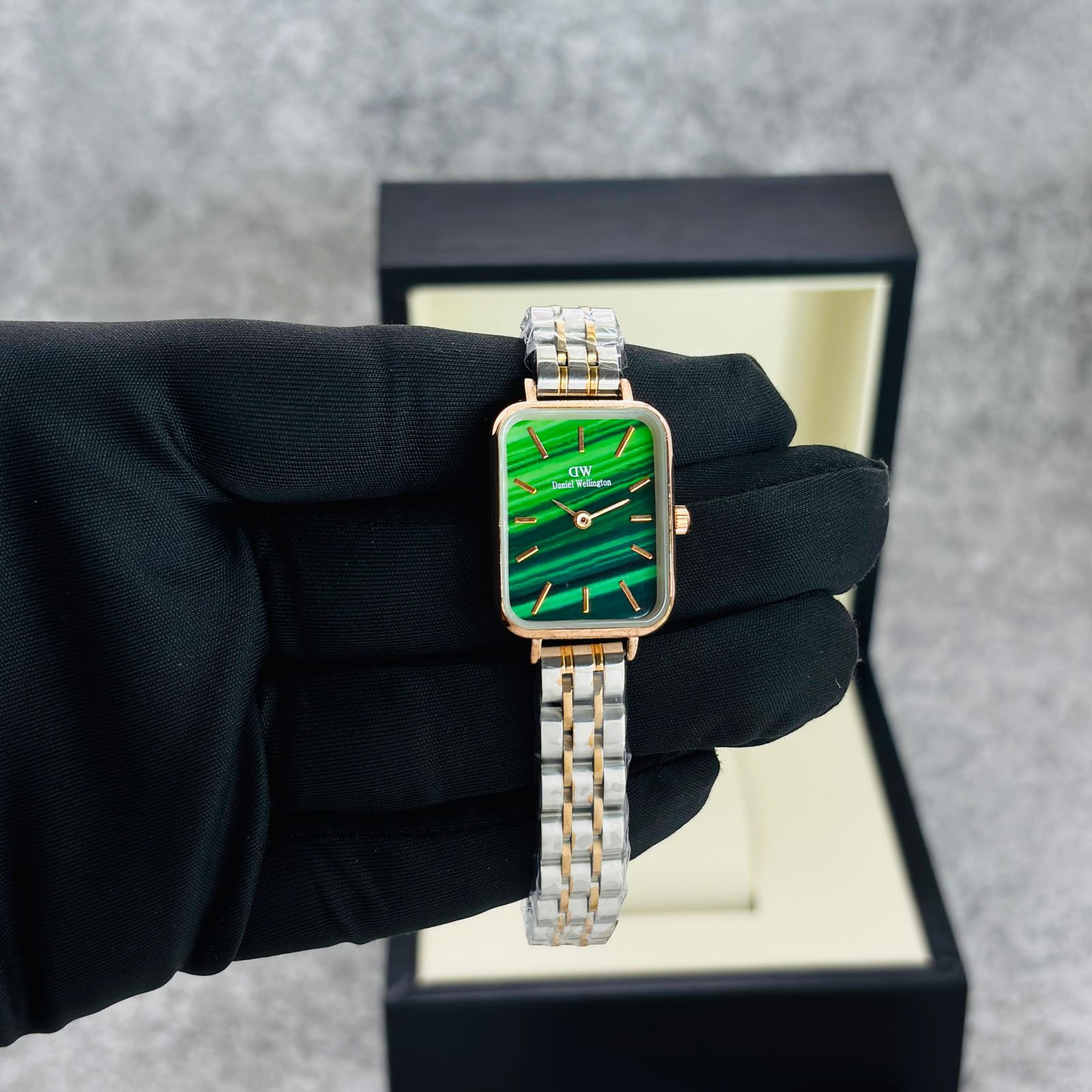 DWW Watch features a Tiger eye and malachite dial